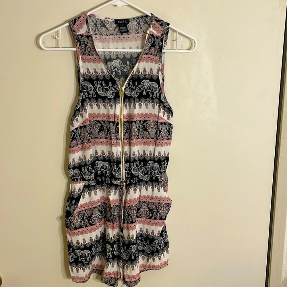 3/$15. Rue 21 woman’s jumpsuit short elephant floral print